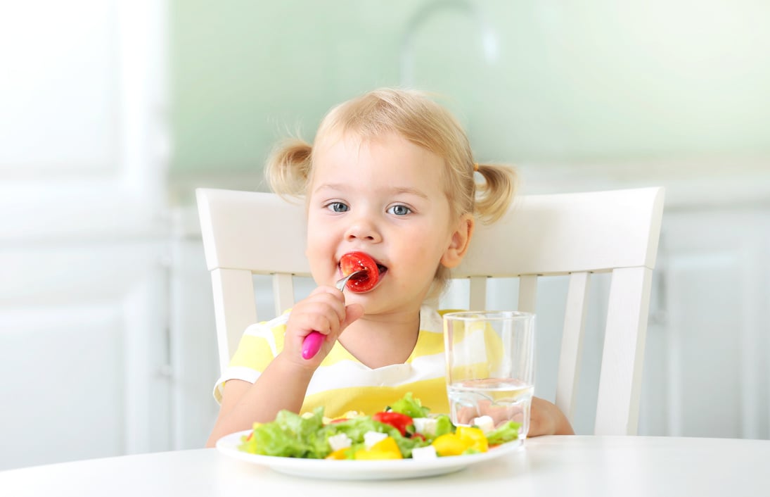 Child girl eating,kid's healthy nutrition.